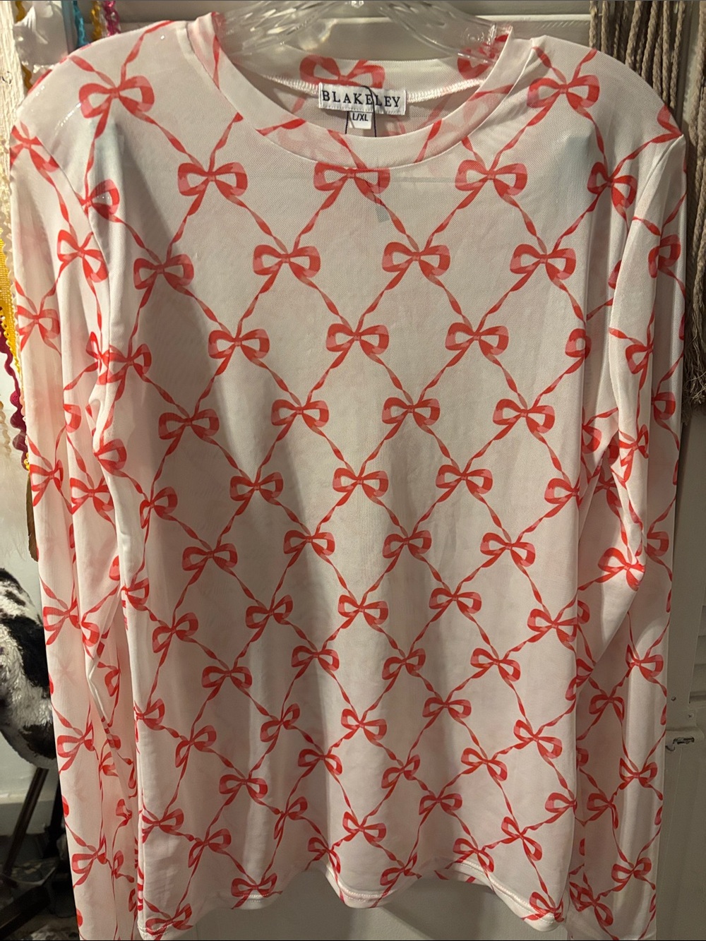 Blakley White Long-Sleeve Top with Coral Bow Print